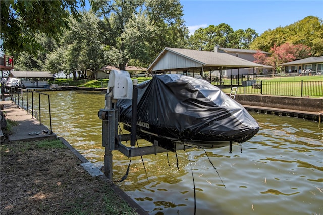 dock area featuring a yard and a water view