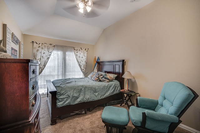 carpeted bedroom featuring ceiling fan and lofted ceiling