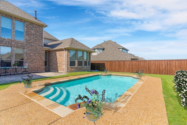 view of swimming pool featuring a patio