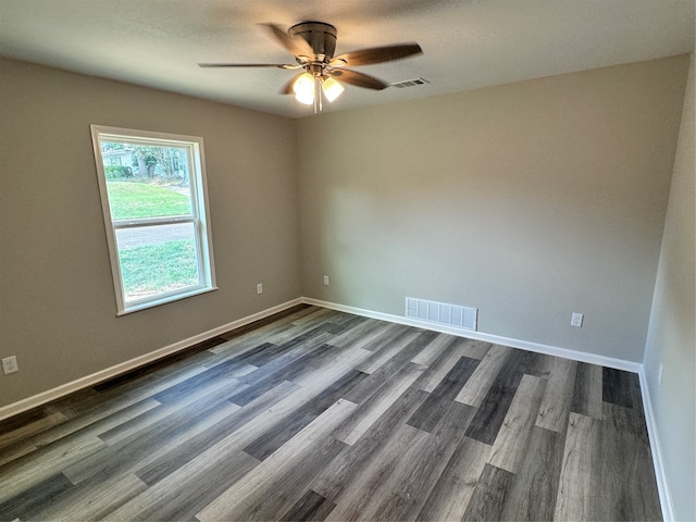 empty room with wood-type flooring and ceiling fan