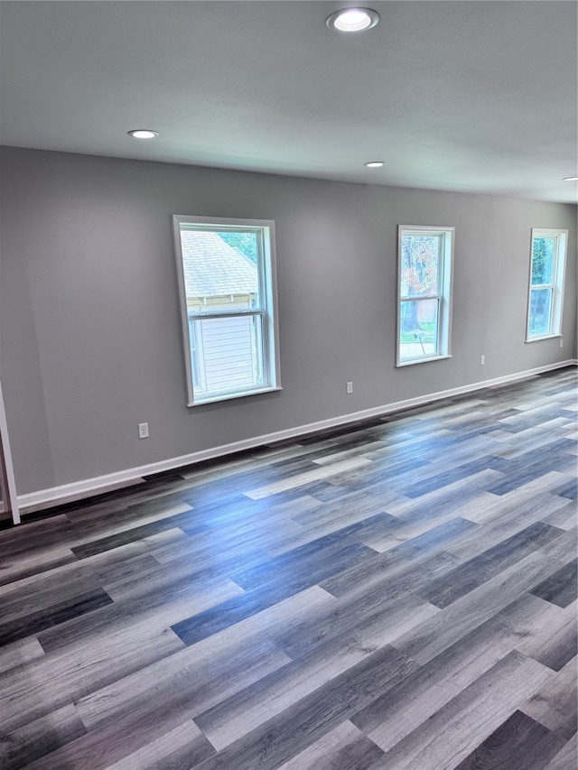 unfurnished room featuring wood-type flooring