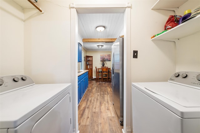 carpeted bedroom featuring ornamental molding, wood ceiling, and ceiling fan