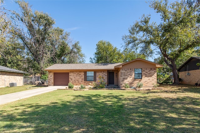 ranch-style house with a front yard and a garage