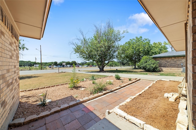 garage featuring a lawn