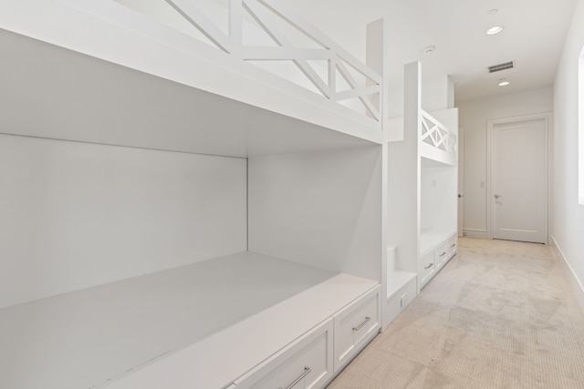 mudroom with light carpet