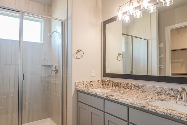 full bathroom featuring tiled shower / bath, vanity, and toilet