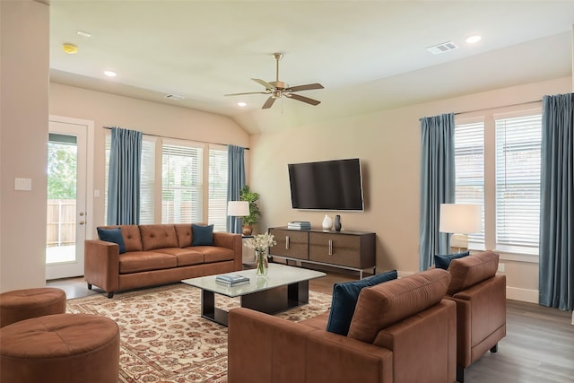 unfurnished room with dark wood-type flooring, ceiling fan, and vaulted ceiling