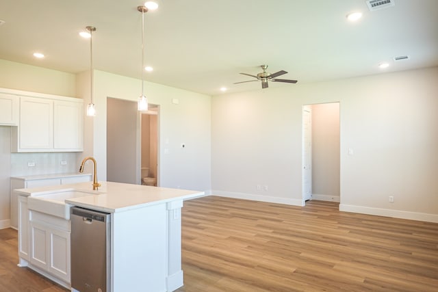 washroom with hookup for a washing machine, gas dryer hookup, electric dryer hookup, and hardwood / wood-style flooring