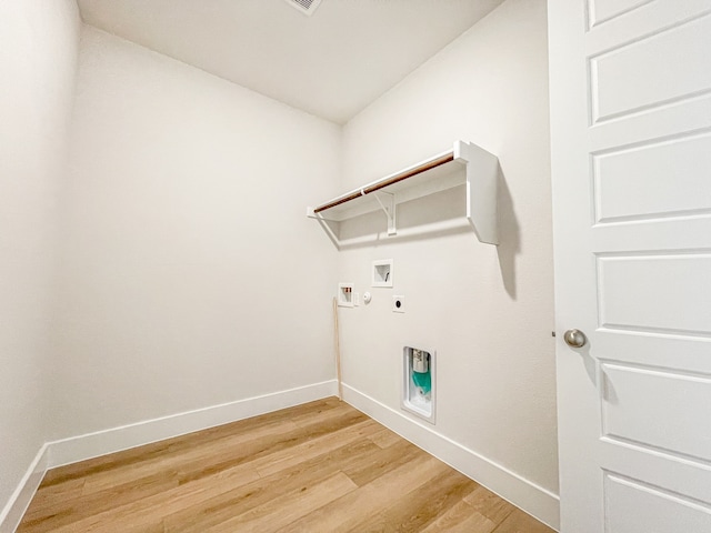 empty room with vaulted ceiling, ceiling fan, and light hardwood / wood-style flooring