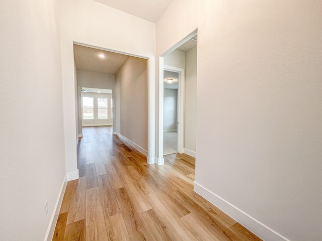 hallway featuring light hardwood / wood-style floors