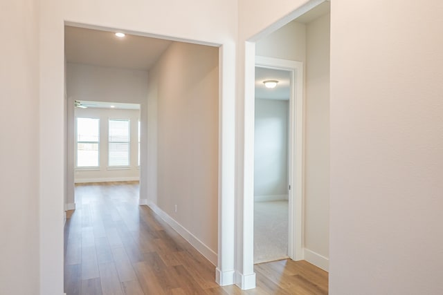 hallway featuring light wood-type flooring