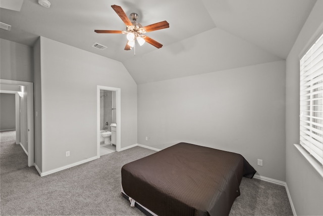 bedroom with ceiling fan, vaulted ceiling, and carpet