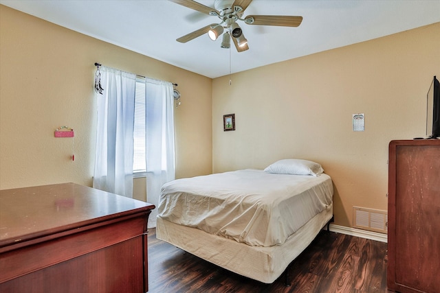 bedroom featuring hardwood / wood-style flooring and ceiling fan