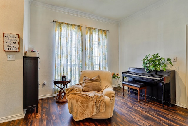 living area featuring dark hardwood / wood-style flooring and crown molding