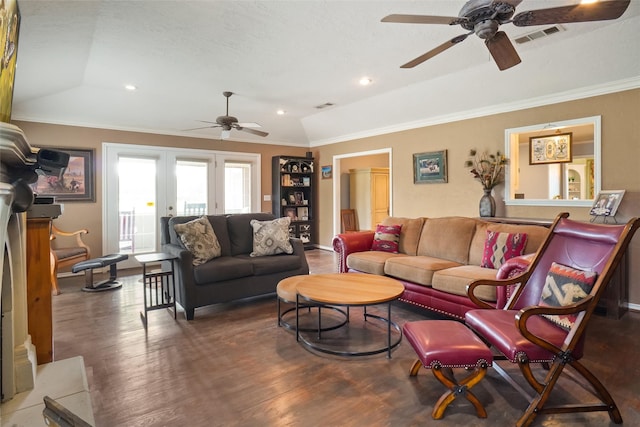 living room featuring hardwood / wood-style flooring, lofted ceiling, and ceiling fan