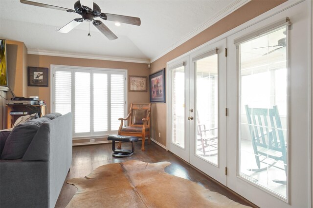 interior space featuring ceiling fan, plenty of natural light, vaulted ceiling, and hardwood / wood-style flooring