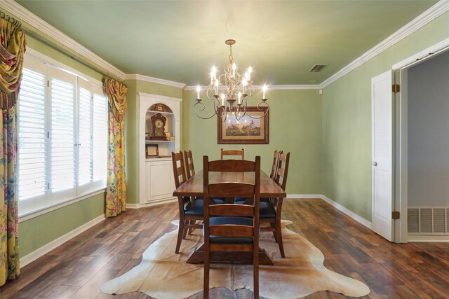 dining space with a notable chandelier, a healthy amount of sunlight, and dark hardwood / wood-style flooring