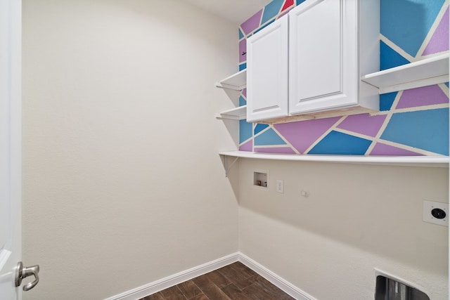 laundry area featuring hookup for an electric dryer, hookup for a gas dryer, dark wood-type flooring, washer hookup, and cabinets