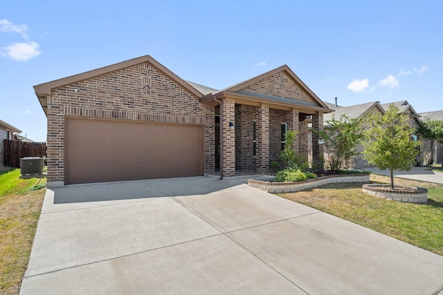 single story home with a front yard, a garage, and central AC unit