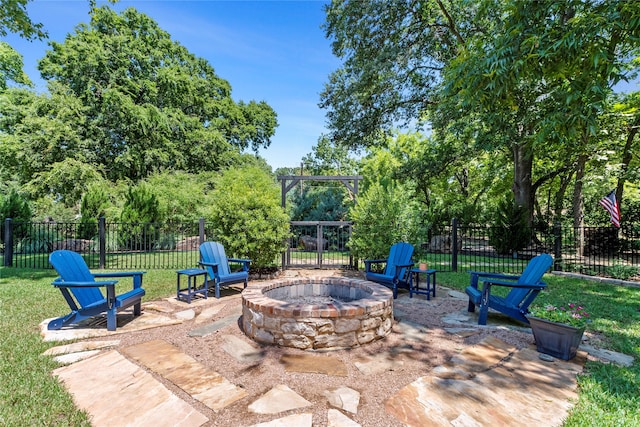 view of patio featuring an outdoor fire pit