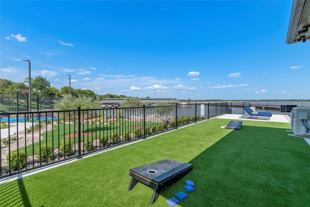 view of yard with a pool