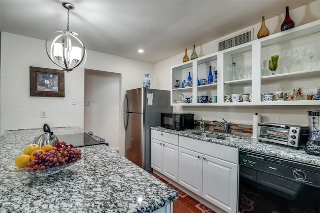 kitchen featuring white cabinetry, a chandelier, sink, black appliances, and hanging light fixtures