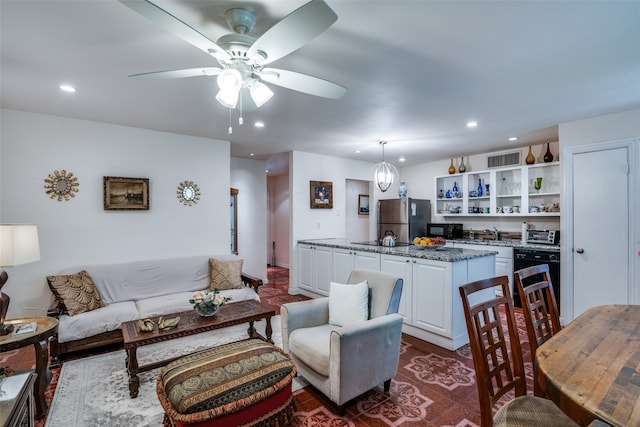 living room with ceiling fan