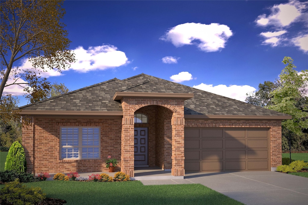 view of front of home with a garage