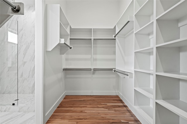2120 Lovedale Ave Unit 101, Dallas, TX 75235 - bathroom featuring a marble finish shower and toilet