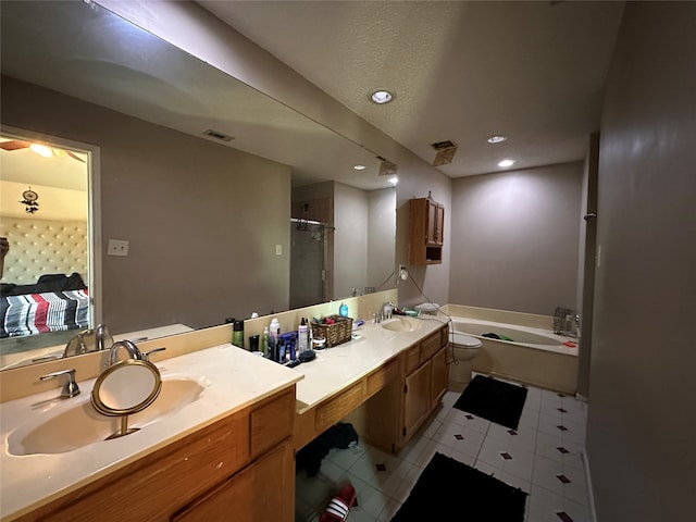 full bathroom featuring tile patterned flooring, double vanity, shower / tub combination, and toilet