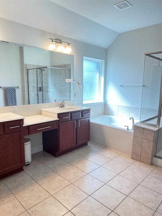 full bathroom featuring a shower stall, vanity, visible vents, a garden tub, and tile patterned flooring