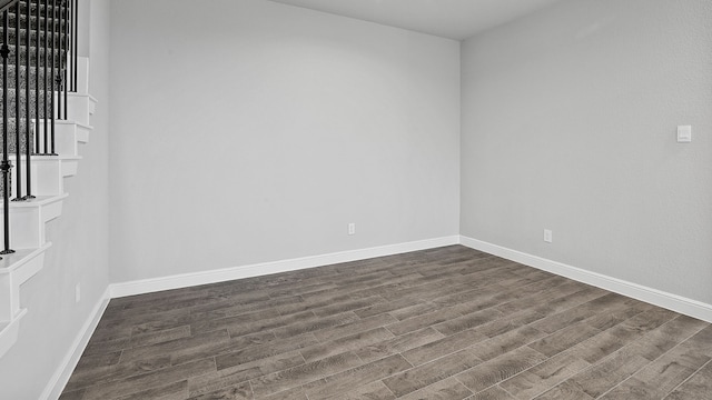 spare room with hardwood / wood-style flooring