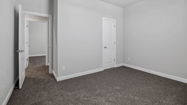 unfurnished bedroom with carpet flooring