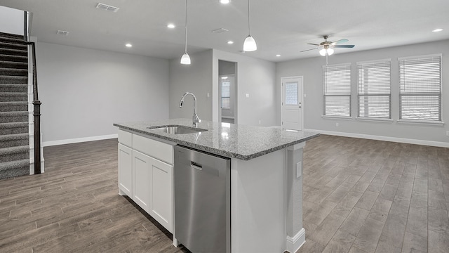 kitchen with sink, light hardwood / wood-style flooring, dishwasher, ceiling fan, and white cabinets