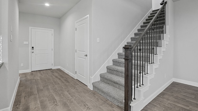 entrance foyer featuring hardwood / wood-style flooring