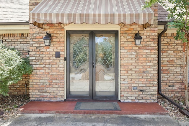 doorway to property featuring french doors