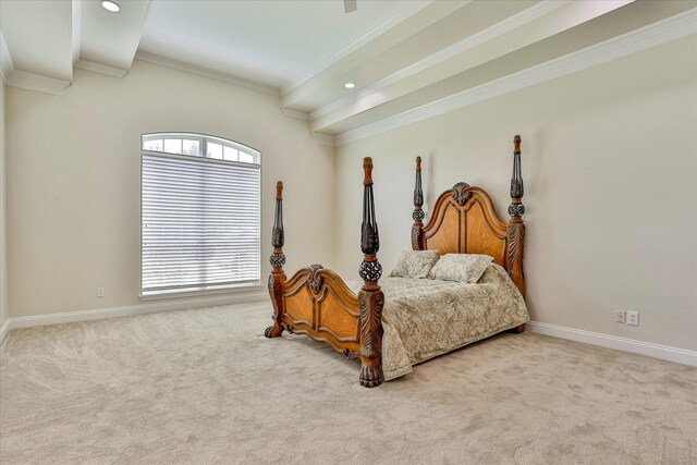 carpeted bedroom with ornamental molding