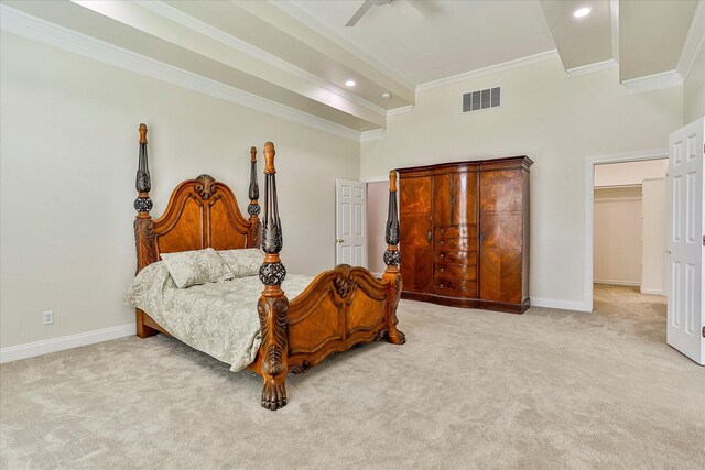 bedroom with ceiling fan, a spacious closet, ornamental molding, and light carpet