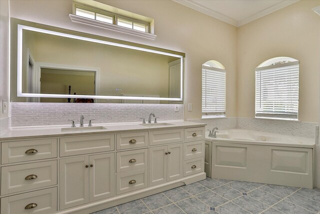 bathroom with dual vanity, tile patterned flooring, tasteful backsplash, ornamental molding, and a tub to relax in