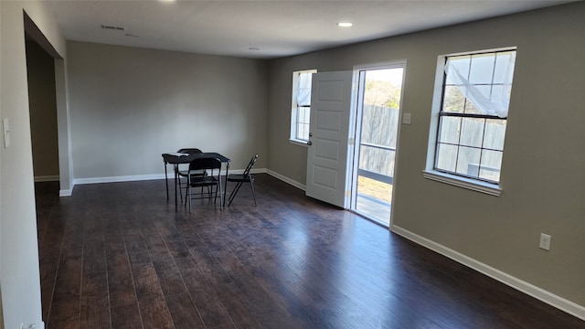 foyer entrance featuring dark hardwood / wood-style flooring