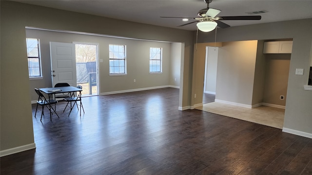 interior space featuring ceiling fan and wood-type flooring