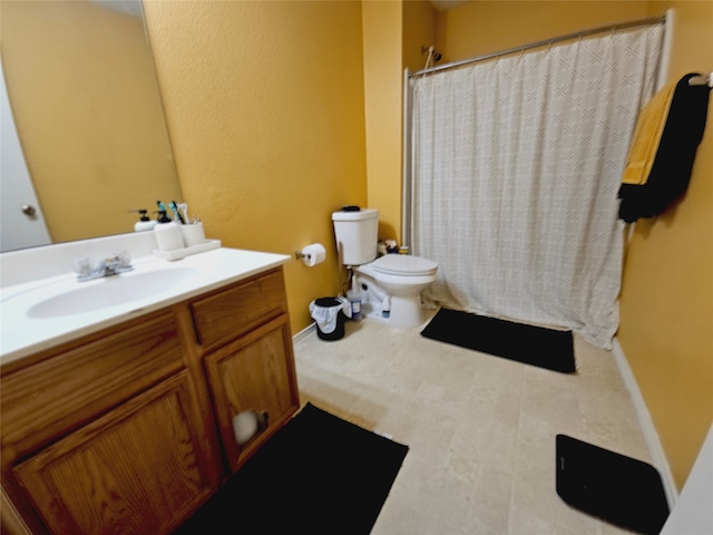 bathroom with vanity, toilet, and a shower with curtain