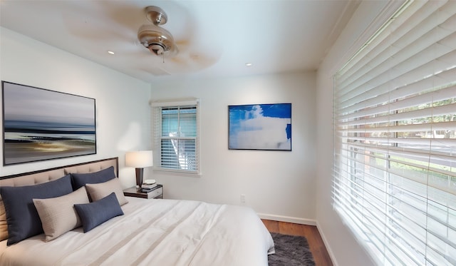 bedroom featuring ceiling fan and wood-type flooring