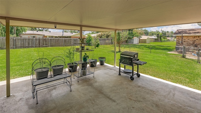 view of patio / terrace featuring a storage shed