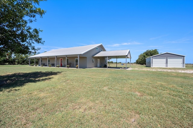 view of front facade featuring an outbuilding, a garage, a carport, a porch, and a front lawn