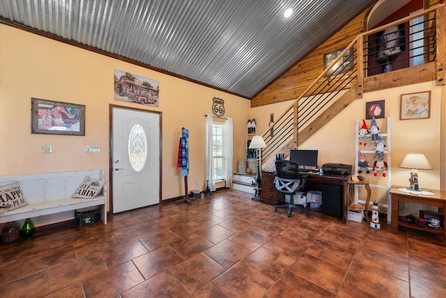 entrance foyer with high vaulted ceiling