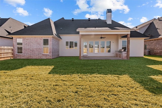 back of house with ceiling fan, central air condition unit, a yard, and a patio