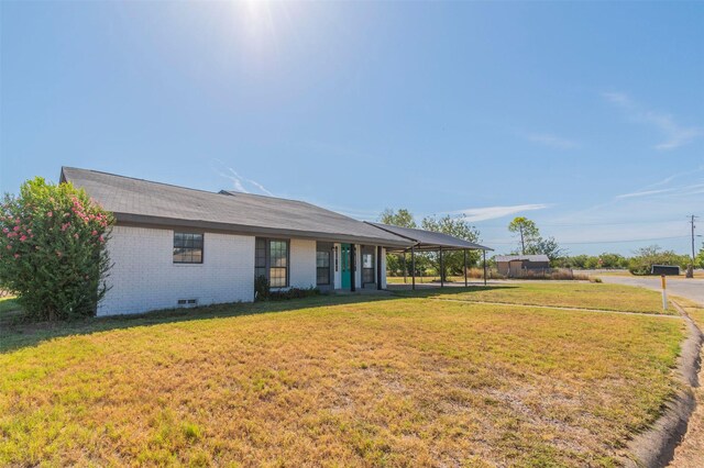 exterior space with a lawn