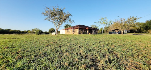 view of yard with a rural view and a gazebo