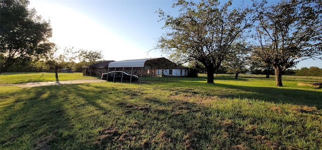 view of yard with a detached carport